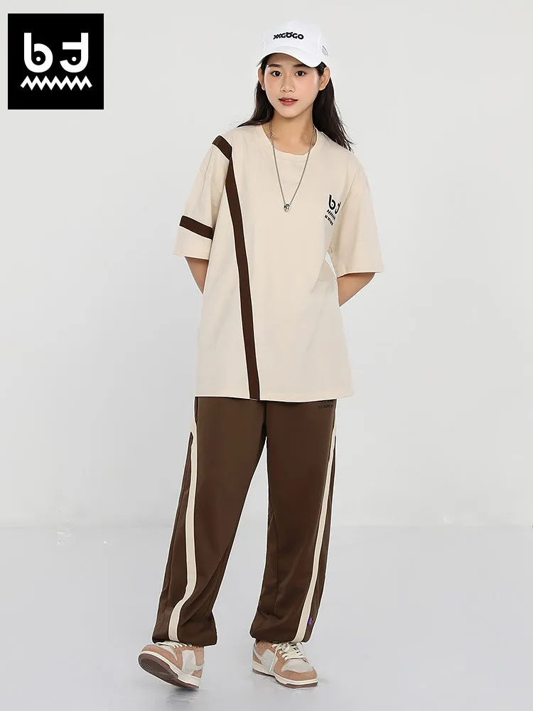 Simple casual style striped ribbon print loose leg drawstring sports pants