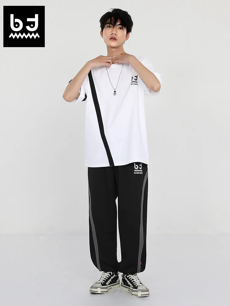 Simple casual style striped ribbon print loose leg drawstring sports pants