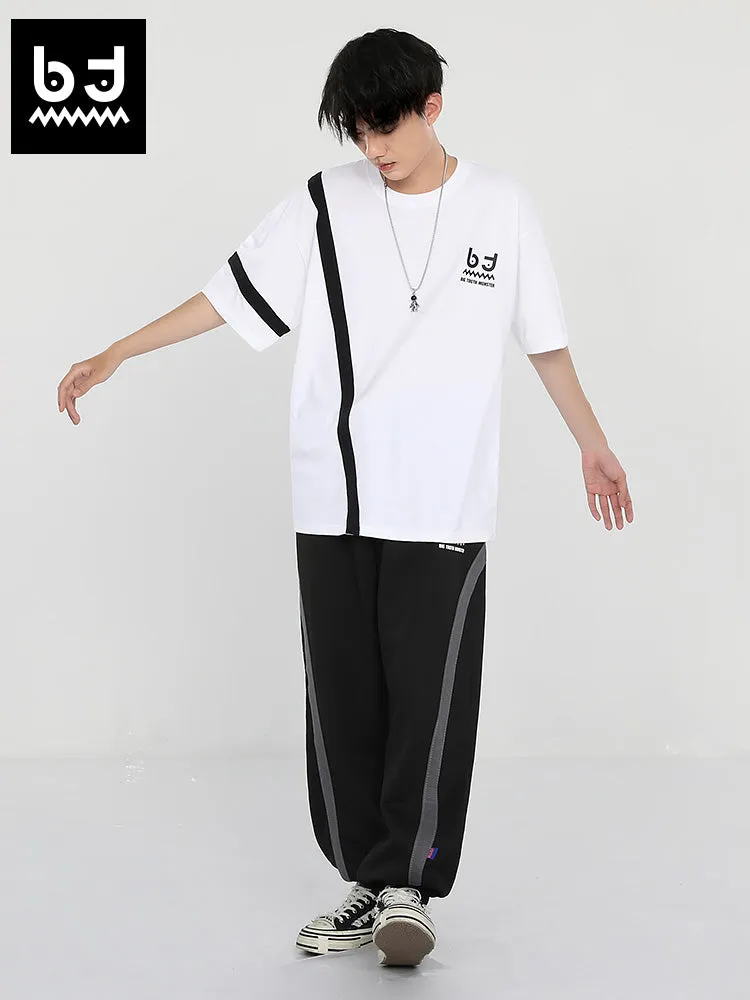 Simple casual style striped ribbon print loose leg drawstring sports pants