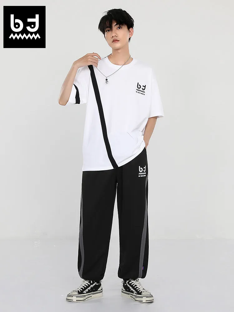 Simple casual style striped ribbon print loose leg drawstring sports pants